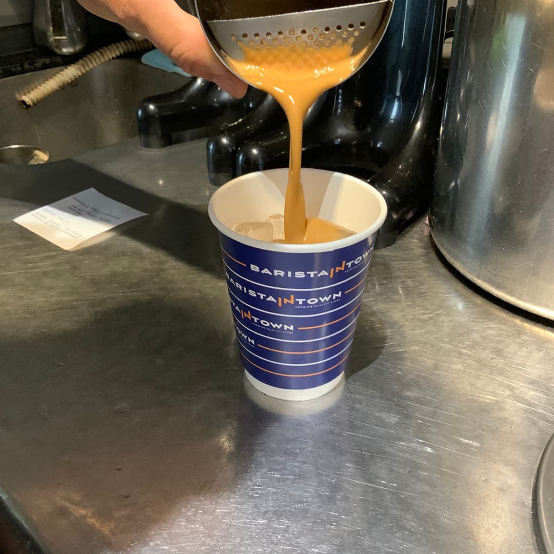Coffee being prepared in a Barista in Town cup